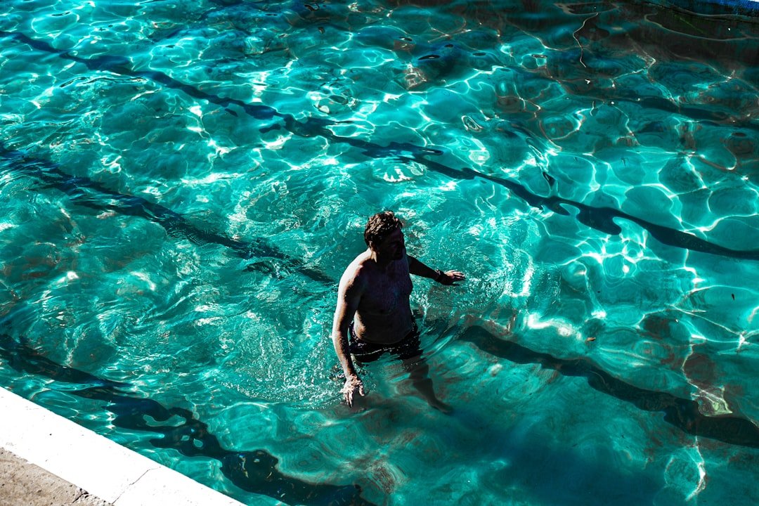 Backyard swimming pool for seasonal pool care advice